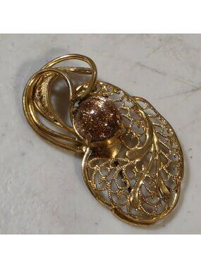Vintage Gold Tone Filigree Brooch Swirl Design Pin Glitter Goldstone Cabochon